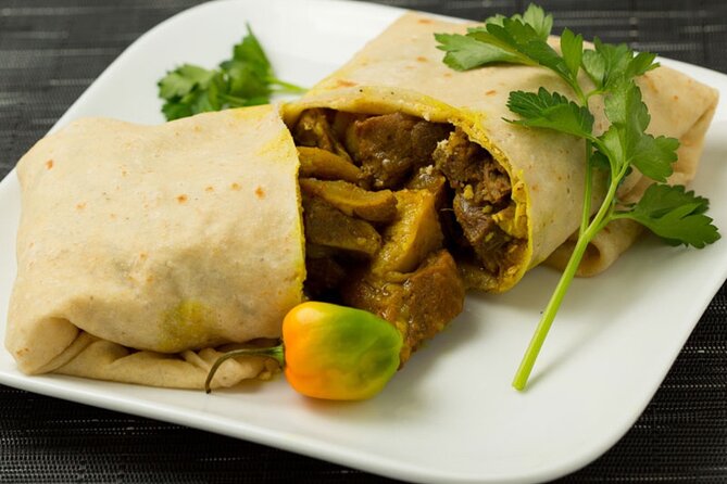 Night Street Food Tasting Tour in Trinidad - St. James: roti with curry potato and chickpeas